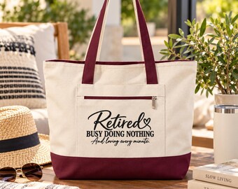 Bolso de lona con cremallera con la frase "Jubilado, ocupado sin hacer nada".