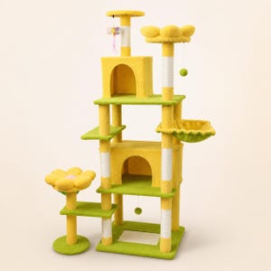 May include: A multi-level cat tree featuring yellow and lime green carpeted platforms, two arched hideaways, a flower-shaped perch, a hanging ball toy, and white sisal-wrapped scratching posts. The structure includes a small side platform.