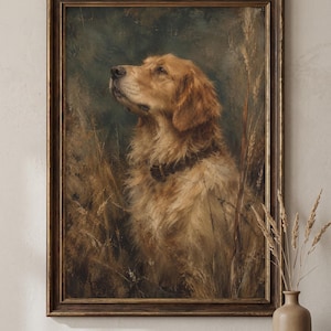May include: A framed oil painting depicting a golden-coloured dog with a dark collar, positioned in a field of tall, dry grasses. The artwork features a dark, moody background and is encased in a dark, ornate wooden frame with gold trim.