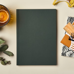 A5 Lay flat Dark Green Notebook. Special A5 lined journal with page numbers and contents page. Beautiful gift