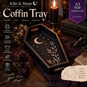 Pode incluir: Uma bandeja preta em formato de caixão com um design branco de lua crescente, estrelas e um ramo botânico na base. A bandeja possui alças integradas nas extremidades. O texto inclui Kiln & Muse, Coffin Tray, A3 PDF Template, 1:1 Scale.
