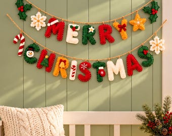 May include: A two-tiered felt banner spelling Merry Christmas in red, green, white, and yellow letters. The garland features decorative felt icons including holly, snowflakes, a star, a snowman, a Christmas tree, a bell, and a candy cane.