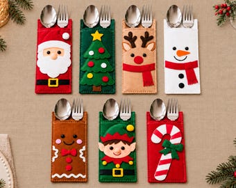 May include: Seven felt cutlery holders featuring Christmas designs including Santa Claus, a green tree, a reindeer, a snowman, a gingerbread person, an elf, and a candy cane. Each rectangular sleeve holds a silver metal spoon and fork.