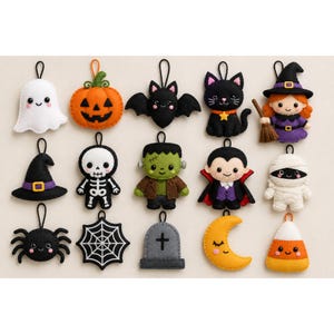 May include: A collection of fifteen felt Halloween ornaments featuring a white ghost, orange pumpkin, black bat, black cat, witch, black hat, skeleton, Frankenstein monster, vampire, mummy, black spider, spiderweb, tombstone, moon, and candy corn.