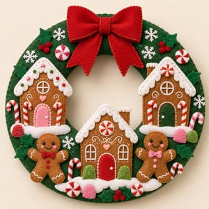 May include: A circular dark green felt wreath decorated with three gingerbread houses, two gingerbread people, a large red felt bow at the top, white felt snowflakes, red and white peppermint candies, and green holly leaves with red berries.
