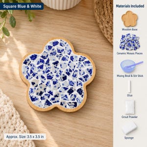 May include: A flower-shaped wooden base filled with blue and white ceramic mosaic pieces. The kit includes a wooden base, ceramic mosaic pieces, a mixing bowl, a stir stick, glue, grout powder, and a sponge. The finished item measures 3.5 by 3.5 inches.
