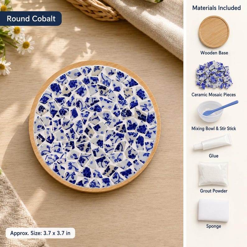 May include: A round cobalt mosaic craft kit featuring a circular wooden base, blue and white floral ceramic pieces, a mixing bowl with a stir stick, glue, grout powder, and a sponge. The finished project measures approximately 3.7 by 3.7 inches.