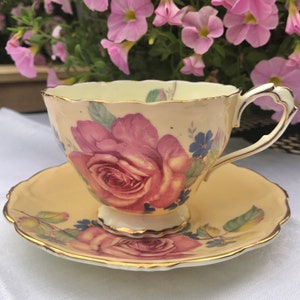 Double Warranted Paragon Teacup and Saucer Set Peach and Yellow with Large Pink Cabbage Roses Extremely Rare Two Tone FREE SHIPPING