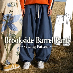 May include: Brookside Barrel Pants Sewing Pattern featuring a blue pair of loose-fitting pants with a drawstring waist and pleated front, alongside a cream pair with blue floral embroidery, and a black and white line drawing of the pants.
