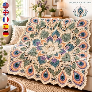 May include: A square crochet blanket featuring a central mandala design with peacock feather motifs in cream, sage green, teal, purple, and peach. The edges are finished with a scalloped border and small bobble accents throughout.