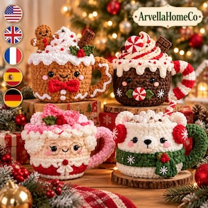 May include: Four crocheted mugs featuring holiday themes: a gingerbread person, a peppermint cocoa, a Mrs. Claus character, and a polar bear. Each mug has a unique face, whipped cream topping, and festive accents like bows, scarves, and candy canes.