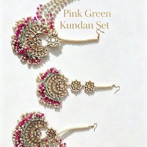 May include: A jewellery set featuring three pieces with gold-tone metal, pink and light green beads, and white pearls. The pieces include crescent-shaped designs with mirror-like accents and beaded chains. The text Pink Green Kundan Set is visible.