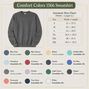 May include: A charcoal grey crewneck sweatshirt displayed next to a size chart with width and length measurements in inches. Below, a color palette grid lists sixteen color options including Blue Jean, Blue Spruce, Butter, Chalky Mint, Chambray, Crimson, Denim, Flo Blue, Grey, Orchid, Light Green, Pepper, Terracotta, True Navy, and White.
