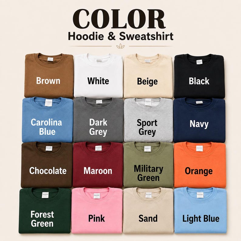 May include: A color chart for hoodies and sweatshirts featuring sixteen folded garments in various shades including brown, white, beige, black, carolina blue, dark grey, sport grey, navy, chocolate, maroon, military green, orange, forest green, pink, sand, and light blue.