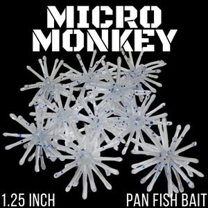 May include: A collection of translucent white fishing lures with blue glitter accents, each featuring a central body with multiple radiating thin appendages. The text MICRO MONKEY is at the top, and 1.25 INCH PAN FISH BAIT is at the bottom.