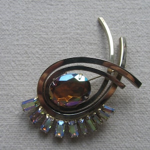 Vintage gold tone modernist brooch with rhinestones