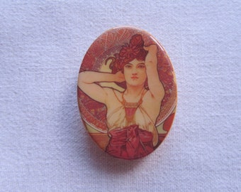 Vintage plastic women's portrait brooch