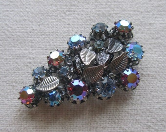 Vintage silver tone blue and pink rhinestones brooch