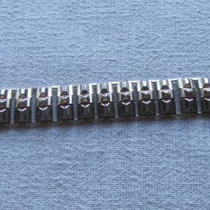 Vintage gold tone signed Coro metallic bracelet