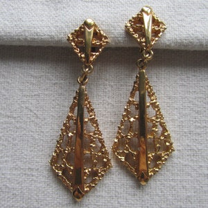 Vintage gold tone brutalist clip on earrings