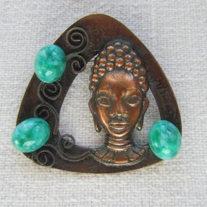 Vintage copper west Germany brooch with green stones