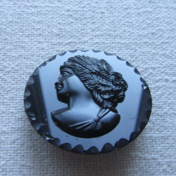 Vintage black cameo plastic brooch