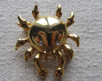 Vintage gold tone small crab brooch with rhinestones