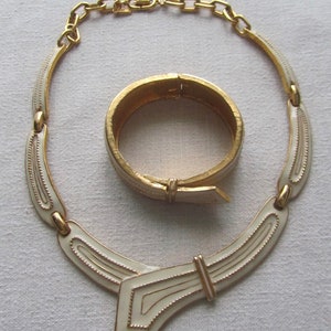 Vintage D&#39;Orlan gold tone white enamel necklace and bracelet set