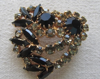 Vintage gold tone black rhinestones brooch