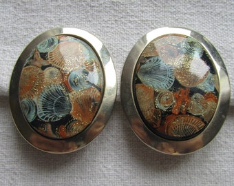 Vintage gold tone with painted plastic oversize clip on earrings