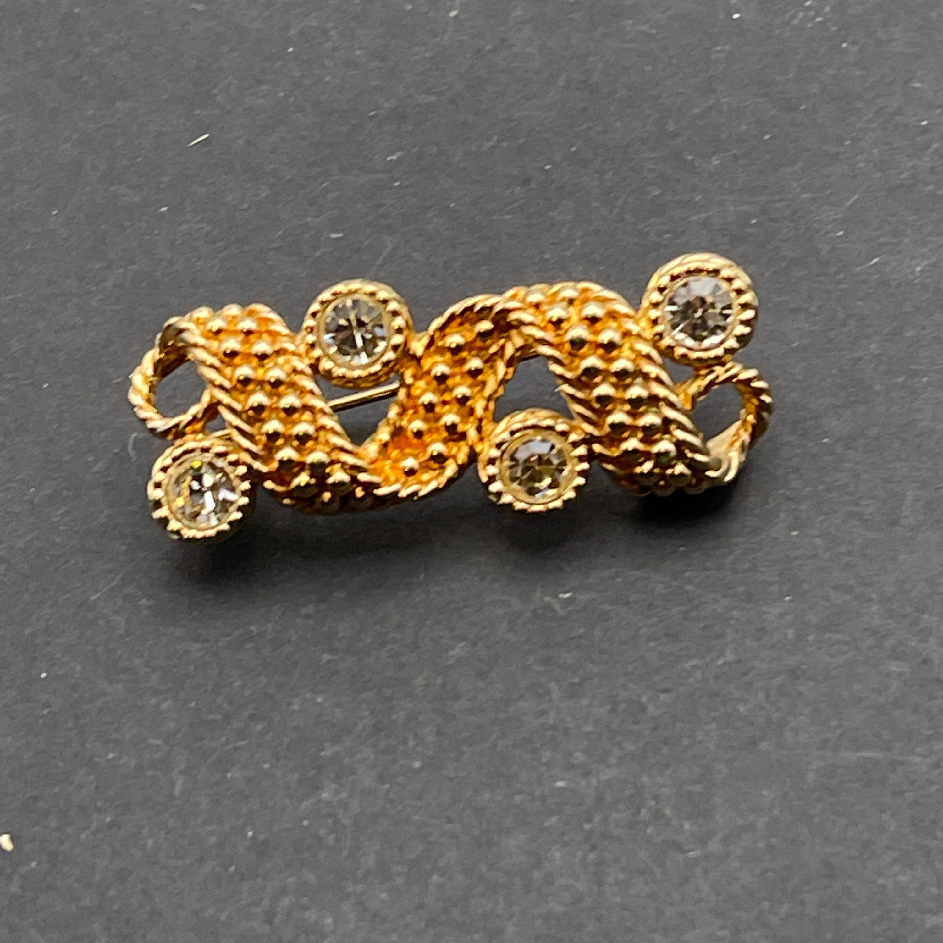 Swarovski Clear Crystal Brooch, Shiny Gold Tone Metal, 5/8 by 1.75