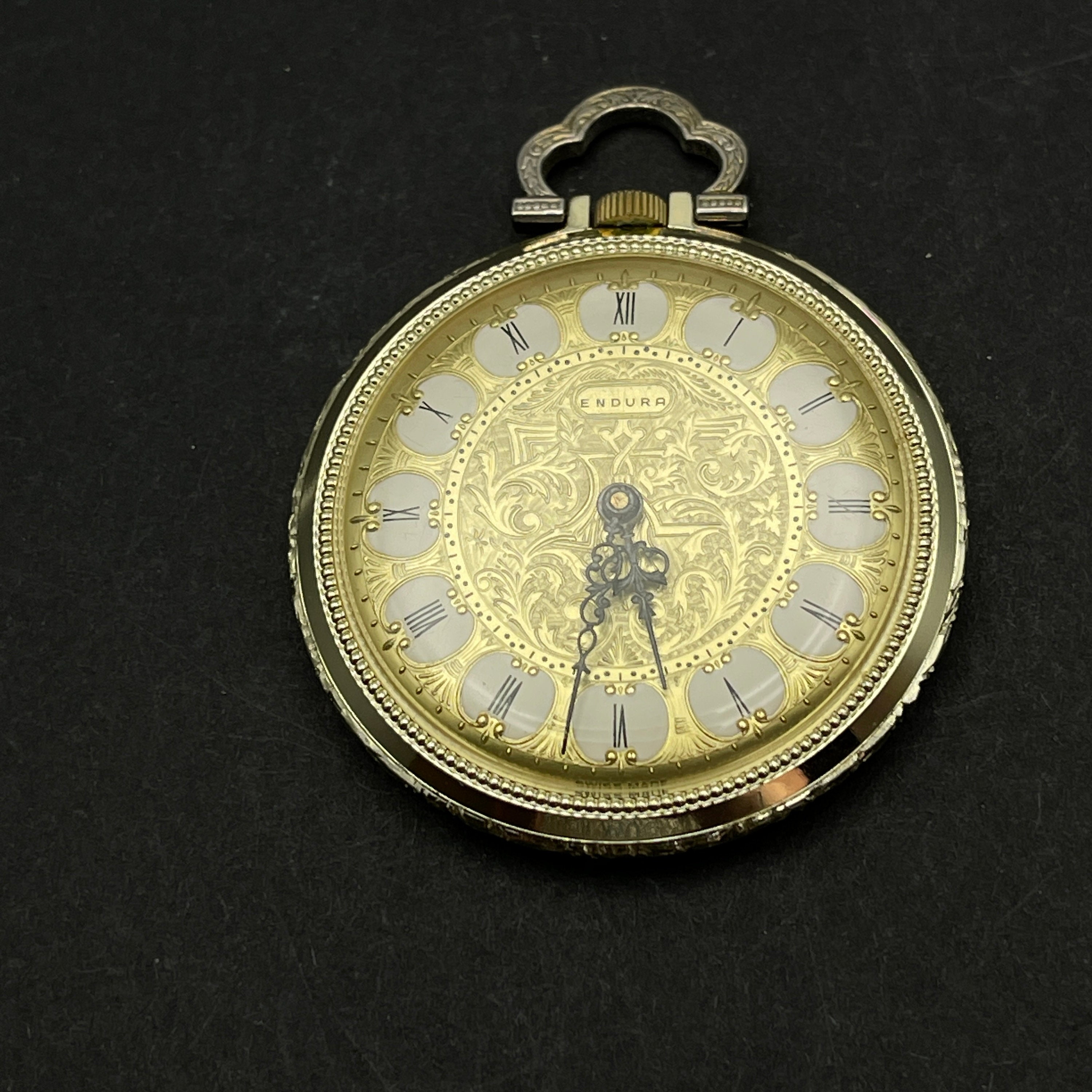 Endura top pendant watch