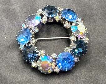 Weiss Wreath Brooch, Shades of Blue Rhinestones with an AB Finish, on Silver Tone Metal, 1.75” in Diameter