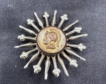 Small, 1 Inch Starburst Pin with a Roman or Greek Soldier Profile Medallion in the Center, C Clasp