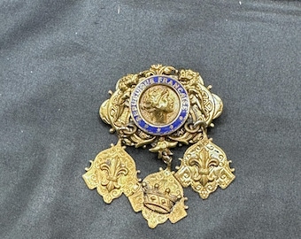 Vintage French Republic Brooch with 3 Dangling Charms, Crown and Fleur de Lis and Features a Profile of Marianne, 1.75” x 2.25”