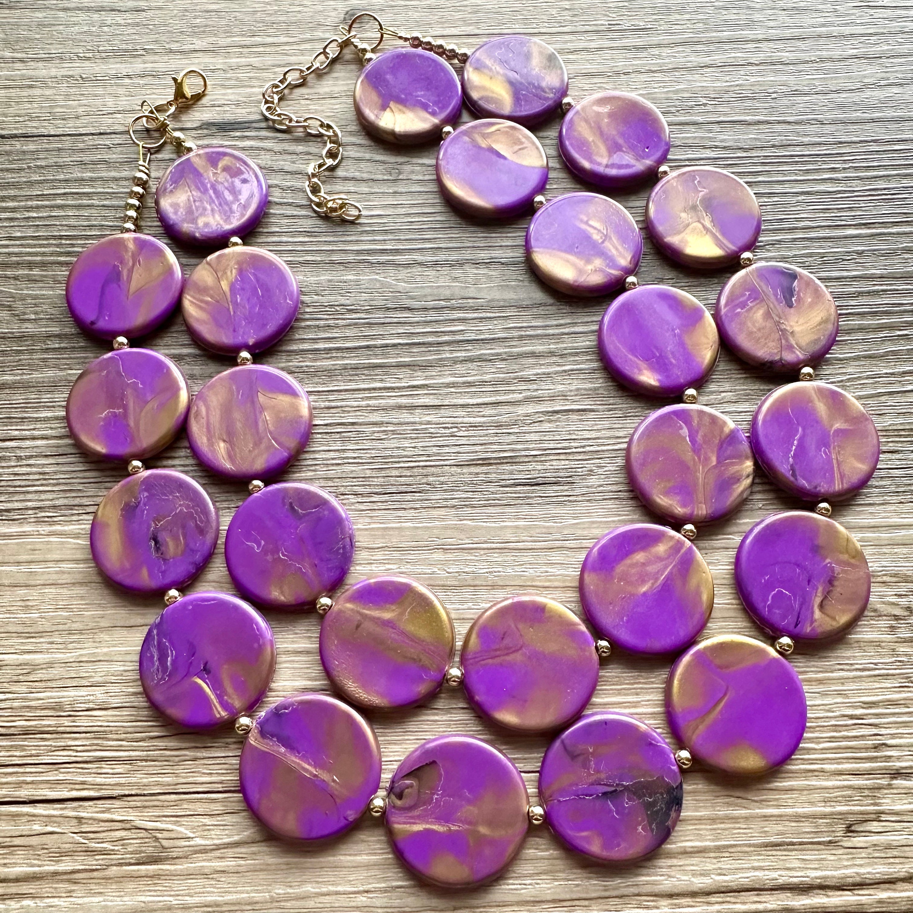 Multi-Strand Purple Bead Necklace – Reed House of Jewels Gold Shield Pendant Multi-Strand Necklace with Purple Beads display picture 1