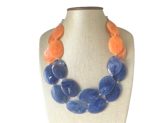 Orange and blue necklace deals