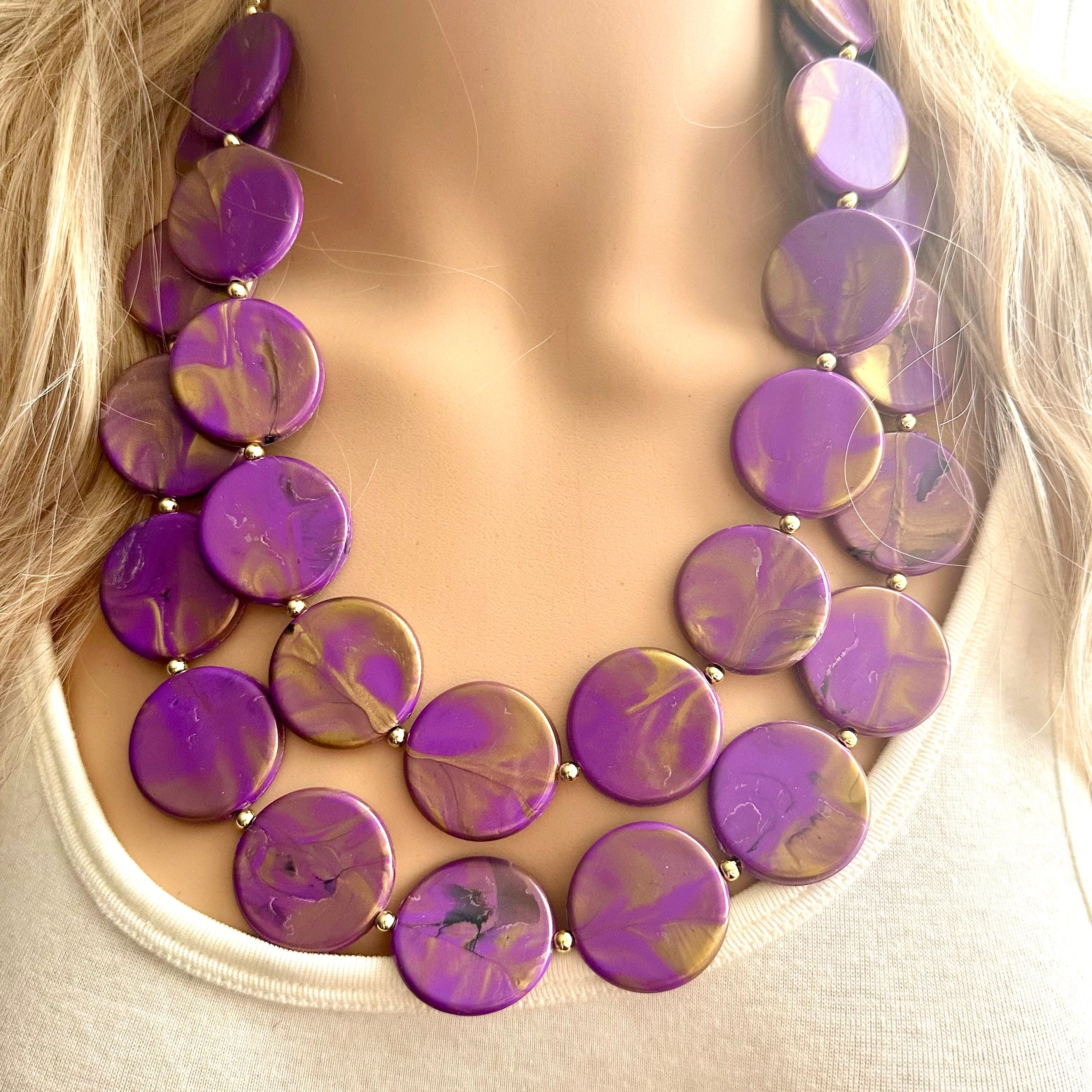 Multi-Strand Purple Bead Necklace – Reed House of Jewels Gold Shield Pendant Multi-Strand Necklace with Purple Beads display picture 1