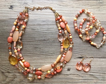 Peach Chunky Statement Necklace & Stretch Bracelet set, Triple Strand Beaded Jewelry, coral pink jewelry, peach bridesmaid marigold gold