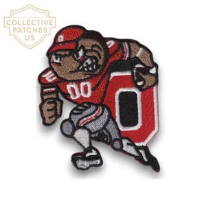 May include: An embroidered patch featuring a brown bulldog mascot wearing a red football uniform with the number 00, running while holding a football in front of a large red and black letter O. The design includes white, grey, and black details.