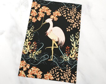 May include: A decorative print with an Art Nouveau design. It features a pink and cream egret standing on one leg, set against a black background. The bird is surrounded by orange, yellow, and teal floral and leaf motifs. The artwork has an Art Nouveau style.