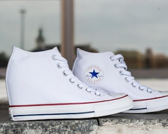 white heeled converse