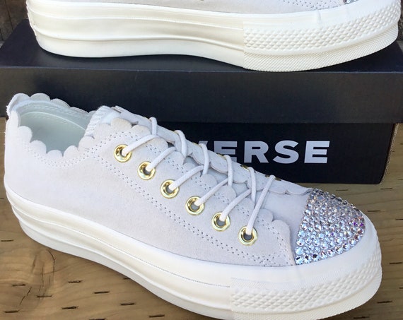 white leather frill converse