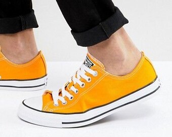 orange low top chucks