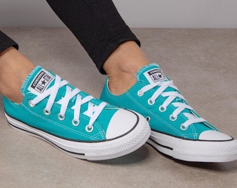 turquoise low top converse