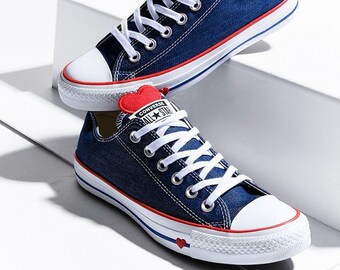 white converse with red heart