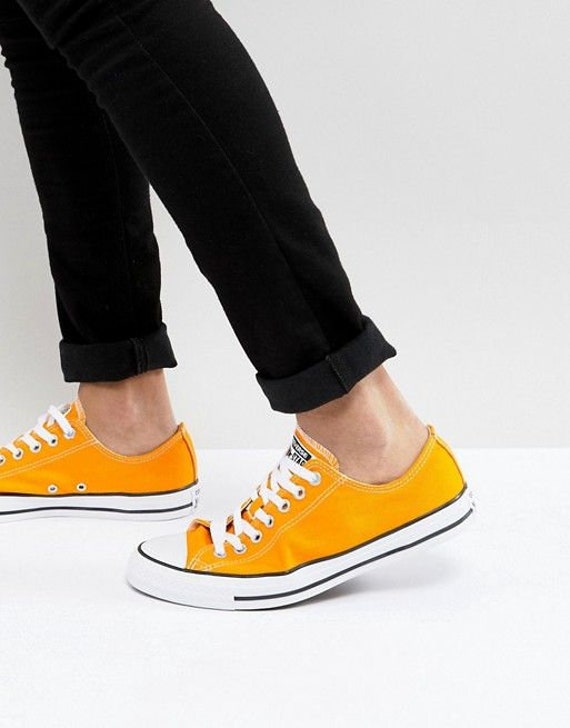 yellow and orange converse