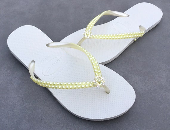 pale yellow flip flops