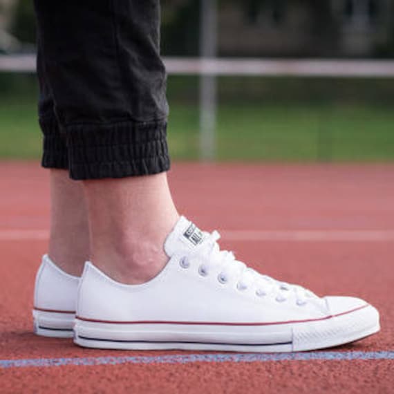 white leather converse low