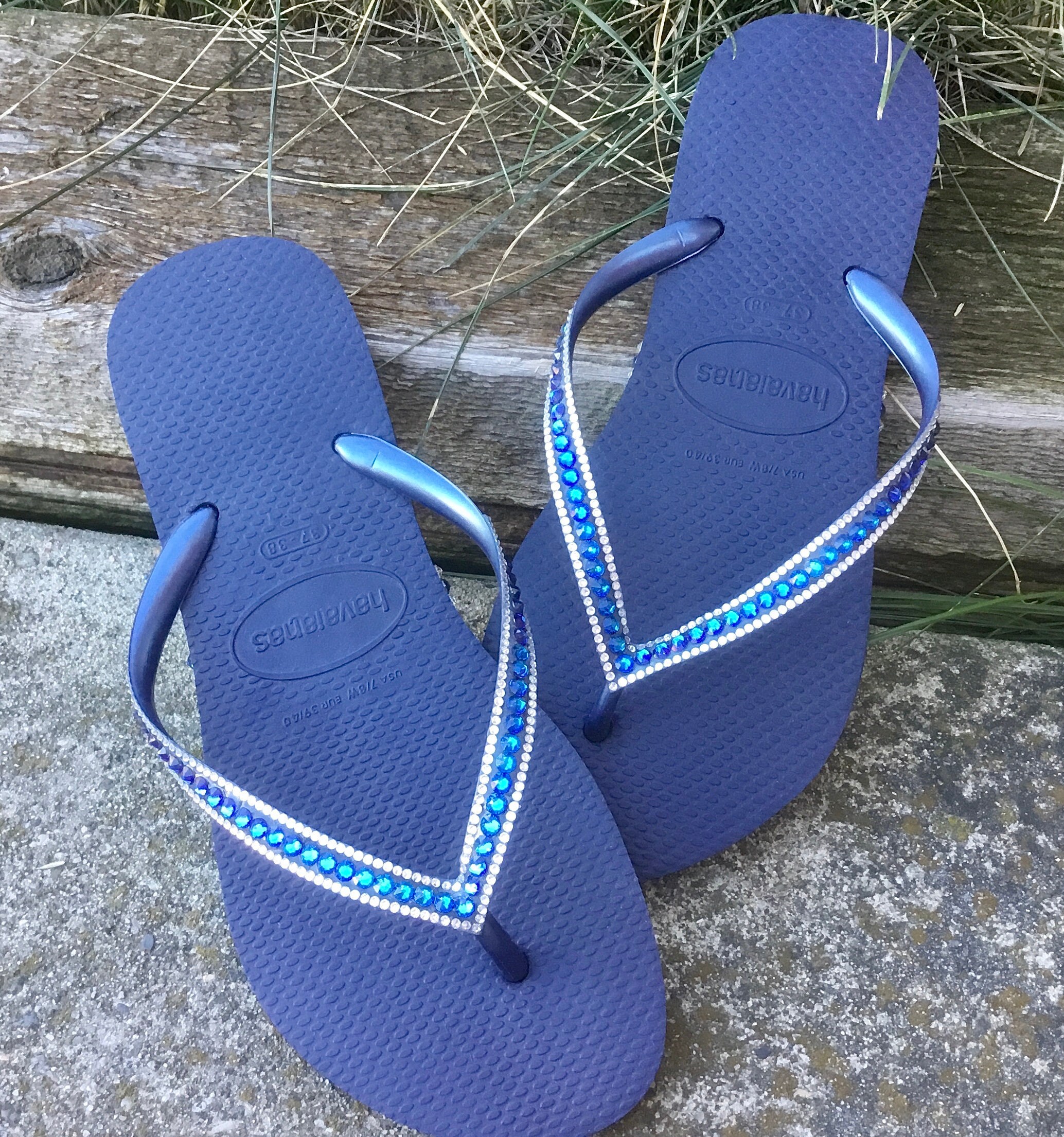 navy blue flip flops with bling